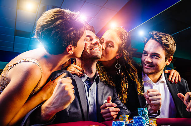 AduQ live dealer table on sgmwin with card dealt and player stations visible
